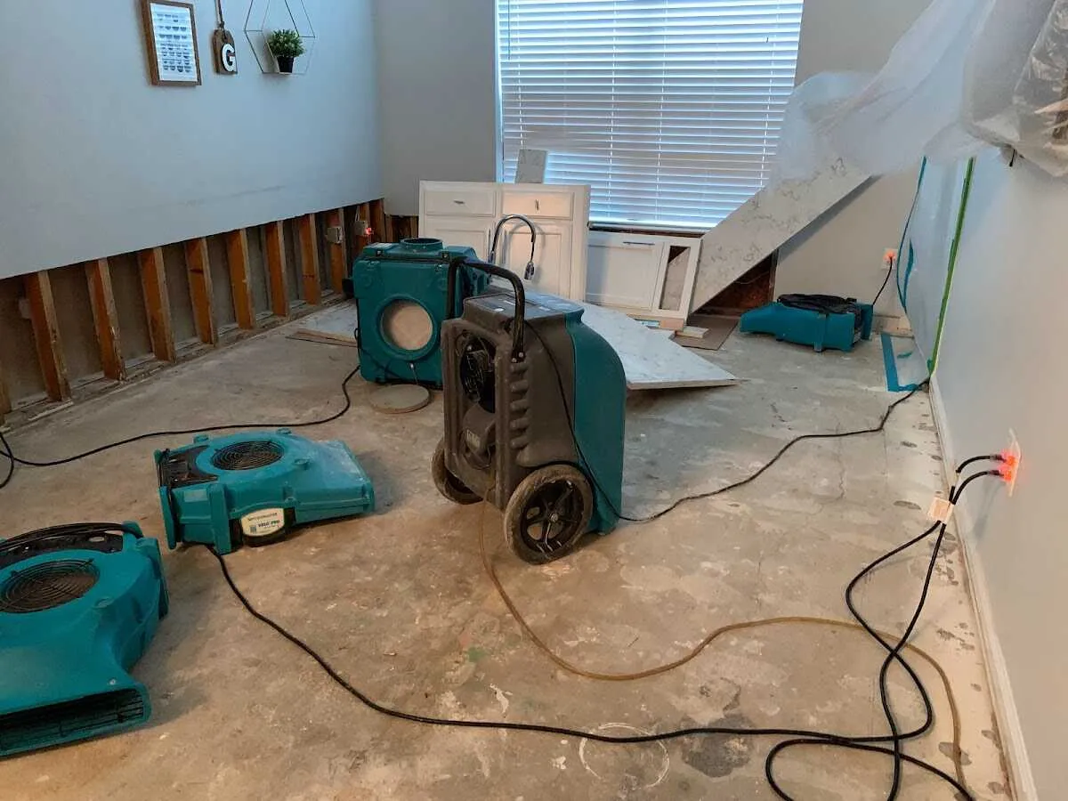 Dehumidifier in flood-cut room for Water Damage Restoration in Dana Point